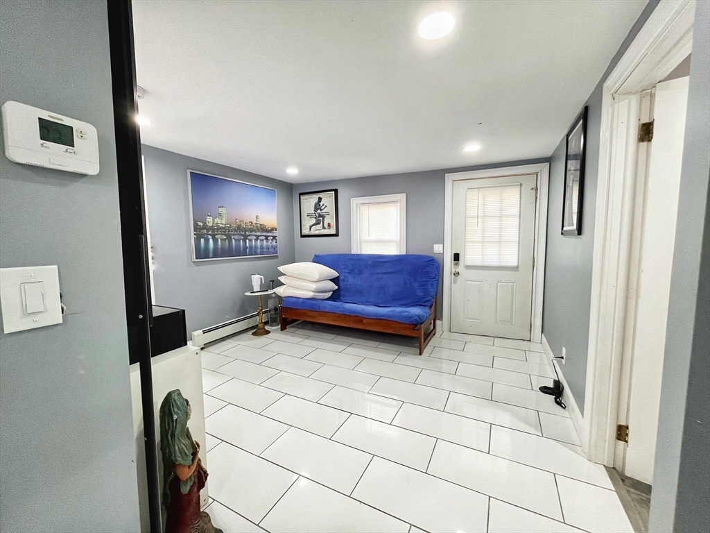 27 Overlook Road Holbrook, MA 02343 - Photo 8 of 25 a spacious bedroom with a bed and a window