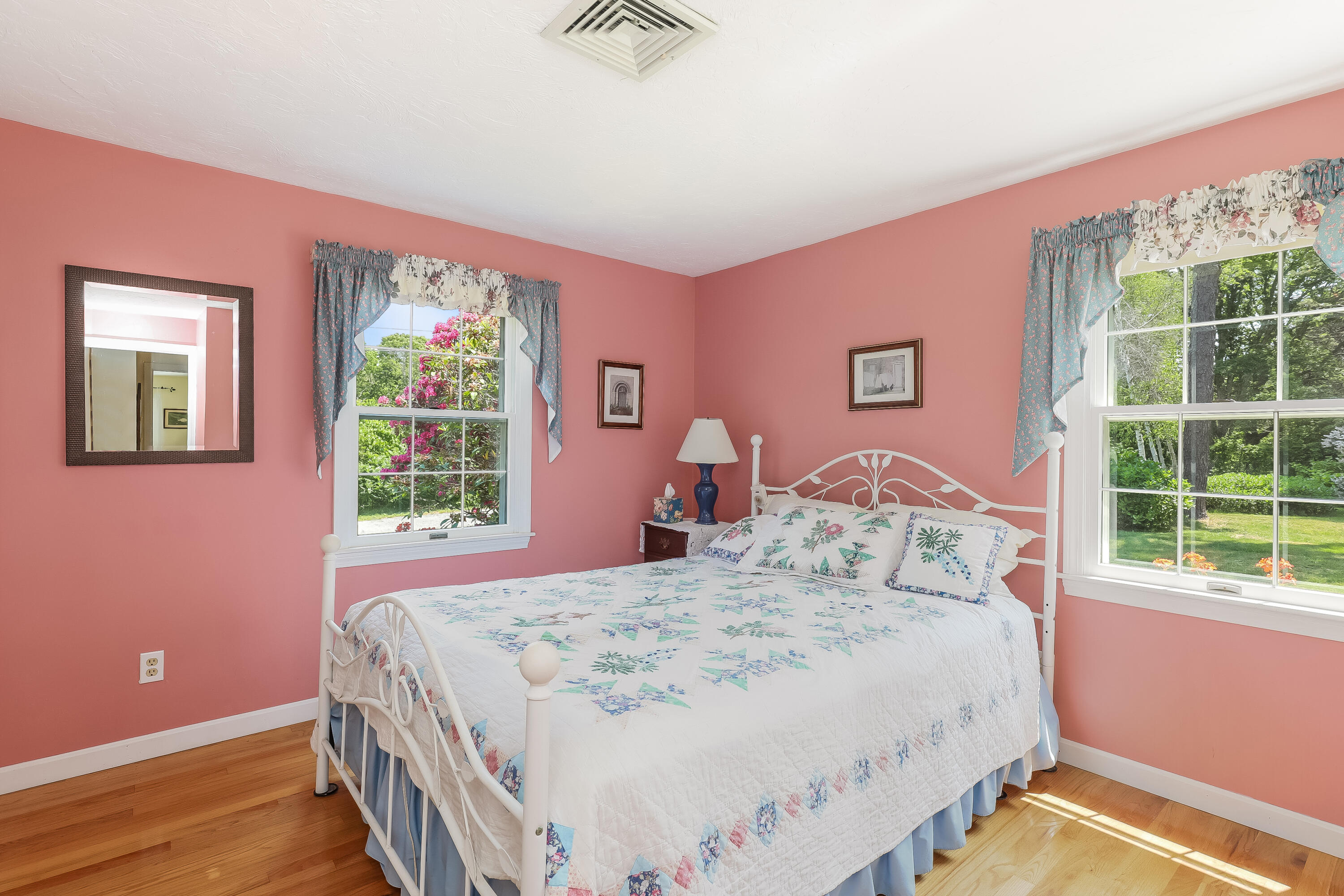 14 Captain Kidd Road East Sandwich, MA 02537 - Photo 16 of 29 a bedroom with a bed and a window