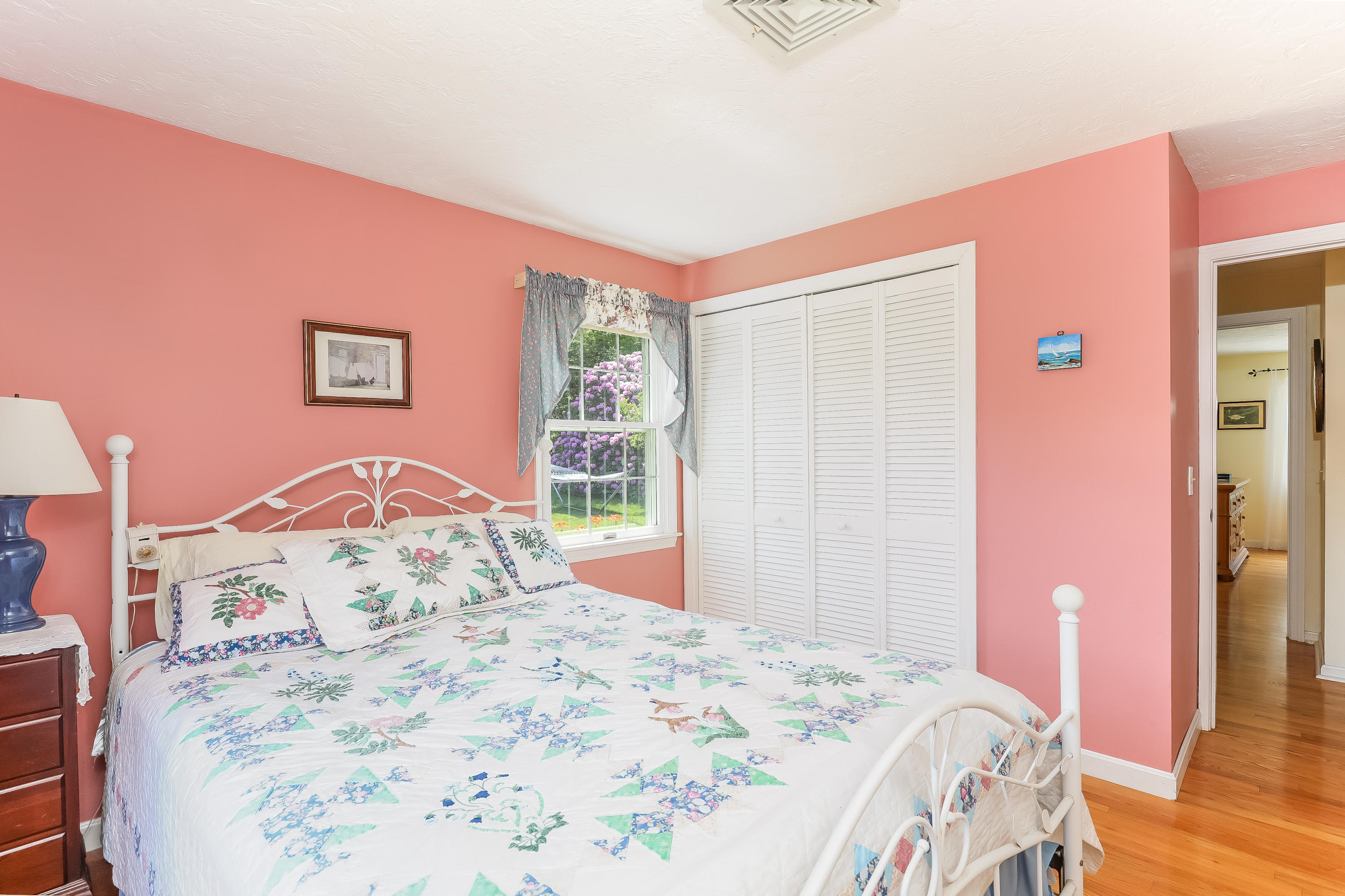 14 Captain Kidd Road East Sandwich, MA 02537 - Photo 17 of 29 a bedroom with a bed and a dresser with wooden floor