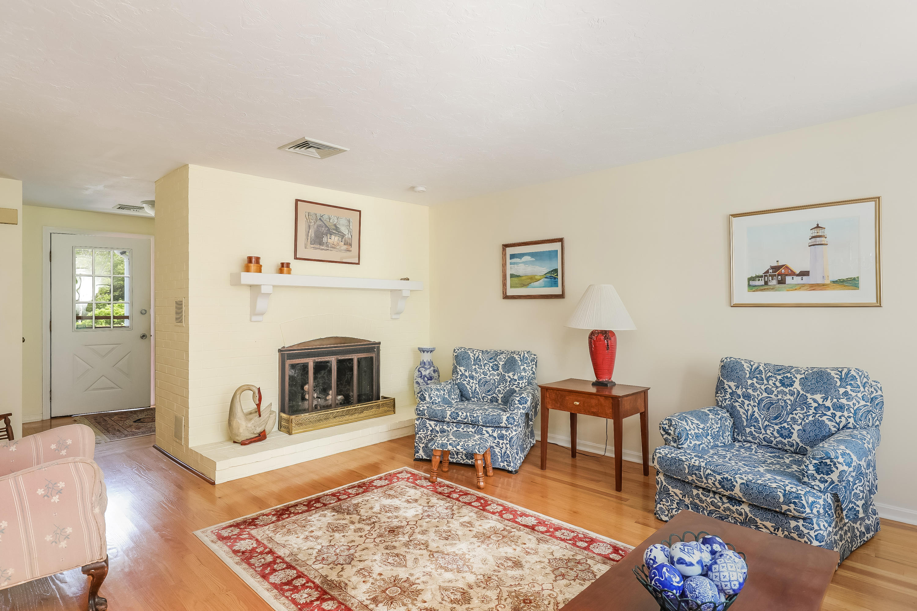 14 Captain Kidd Road East Sandwich, MA 02537 - Photo 3 of 29 a living room with furniture and a fireplace