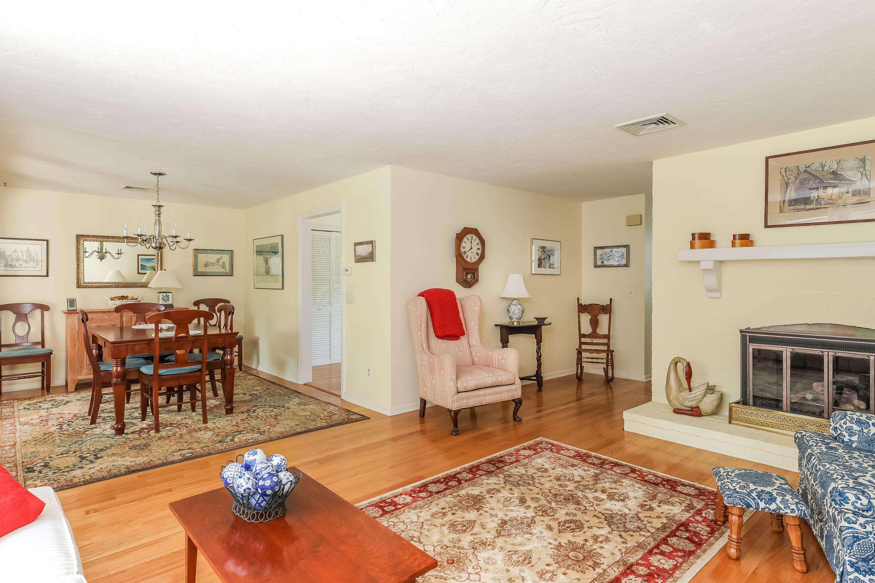 14 Captain Kidd Road East Sandwich, MA 02537 - Photo 4 of 29 a living room with furniture rug and a fireplace