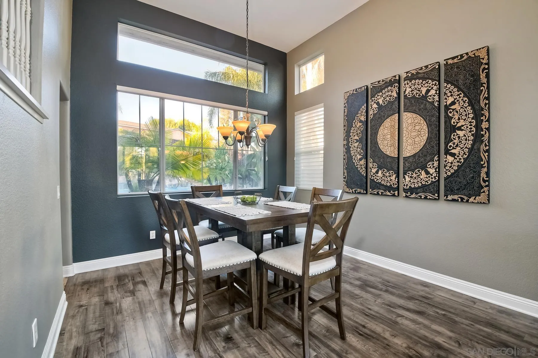 10340 Hitching Post Way Santee, CA 92071 - Photo 11 of 50 a view of a dining room with furniture window and wooden floor