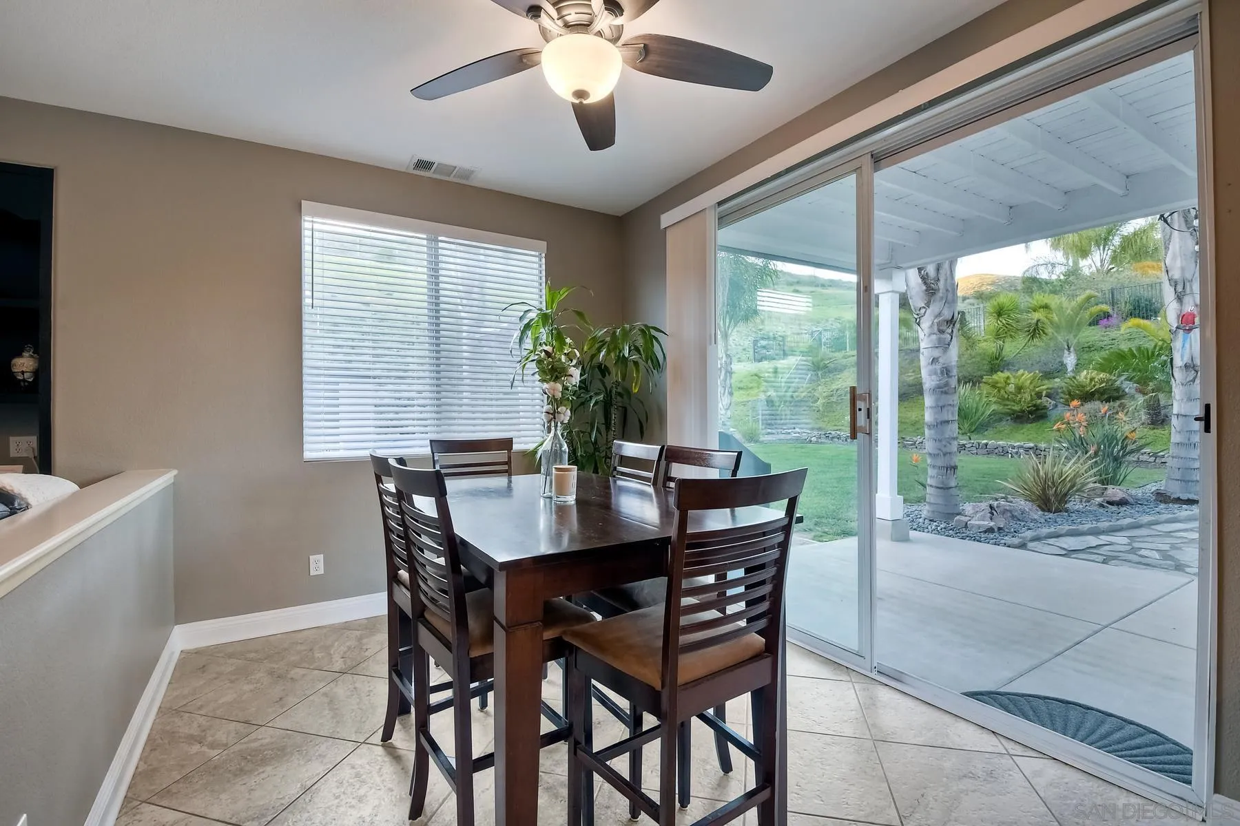 10340 Hitching Post Way Santee, CA 92071 - Photo 17 of 50 a view of a dining room with furniture window and outside view