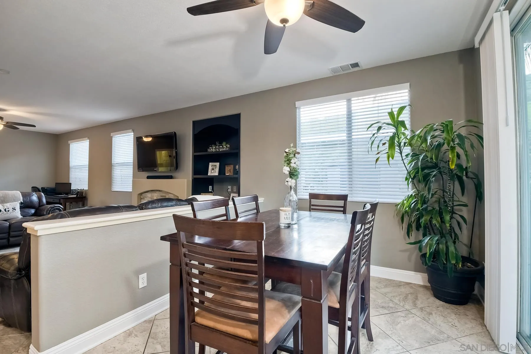 10340 Hitching Post Way Santee, CA 92071 - Photo 18 of 50 a kitchen with a table and chairs in it