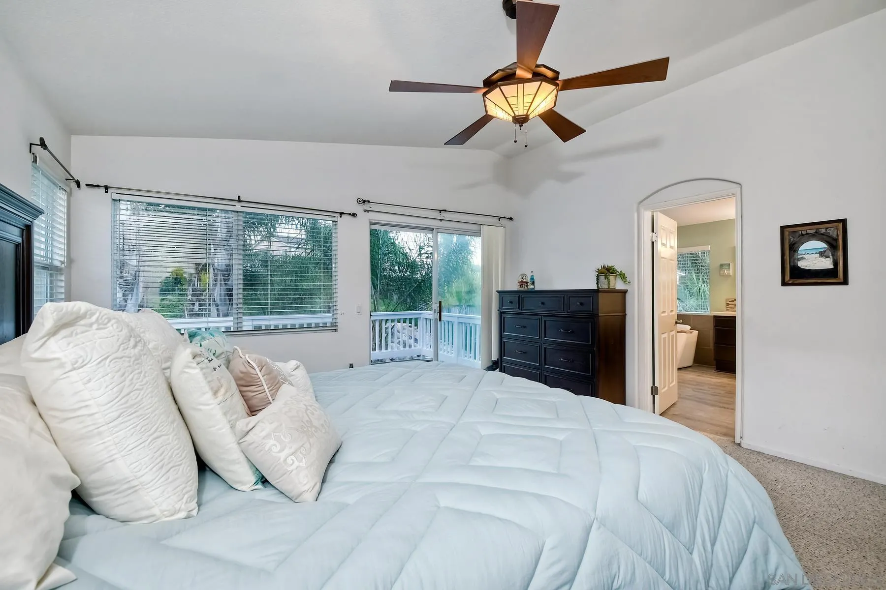 10340 Hitching Post Way Santee, CA 92071 - Photo 25 of 50 a bed sitting in a bedroom next to a window