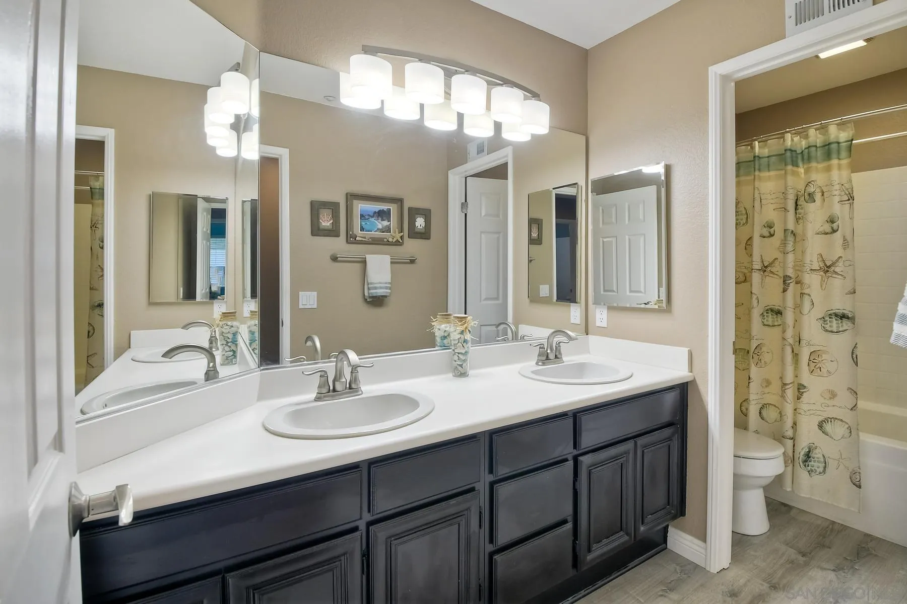 10340 Hitching Post Way Santee, CA 92071 - Photo 33 of 50 a bathroom with a sink double vanity and a mirror
