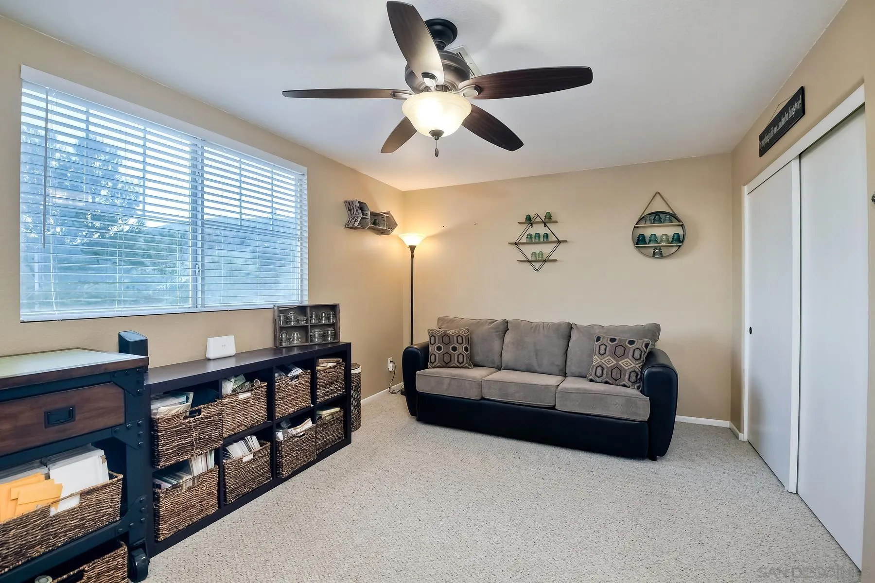 10340 Hitching Post Way Santee, CA 92071 - Photo 34 of 50 a living room with furniture and a flat screen tv