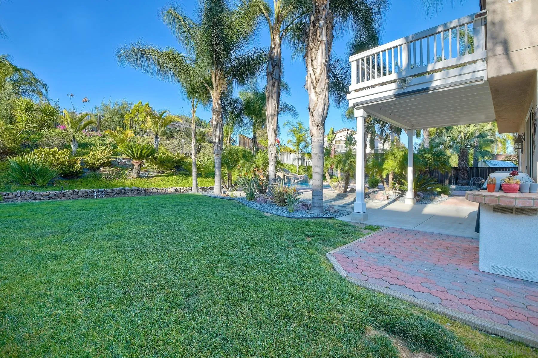 10340 Hitching Post Way Santee, CA 92071 - Photo 35 of 50 a view of a house with a yard porch and sitting area