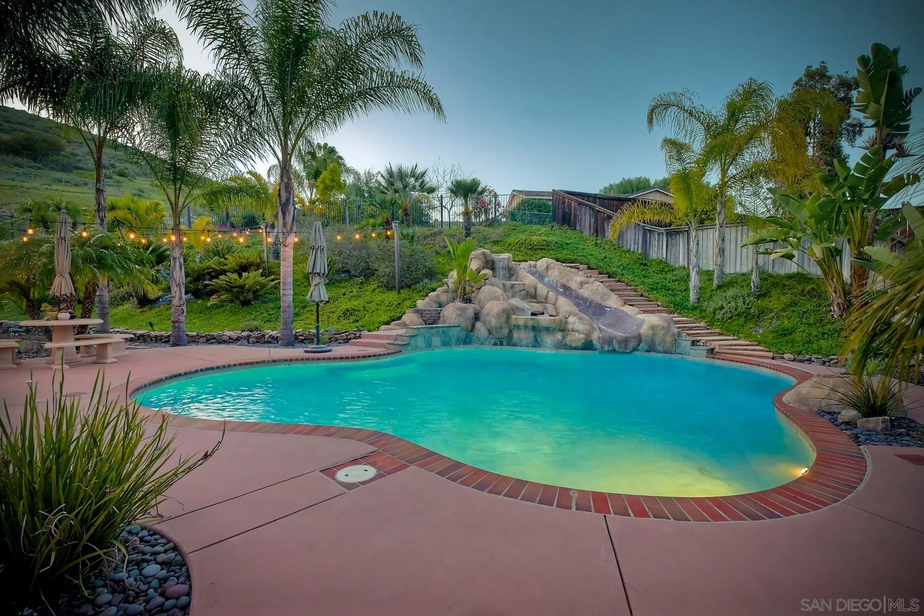 10340 Hitching Post Way Santee, CA 92071 - Photo 42 of 50 a view of a swimming pool with a garden