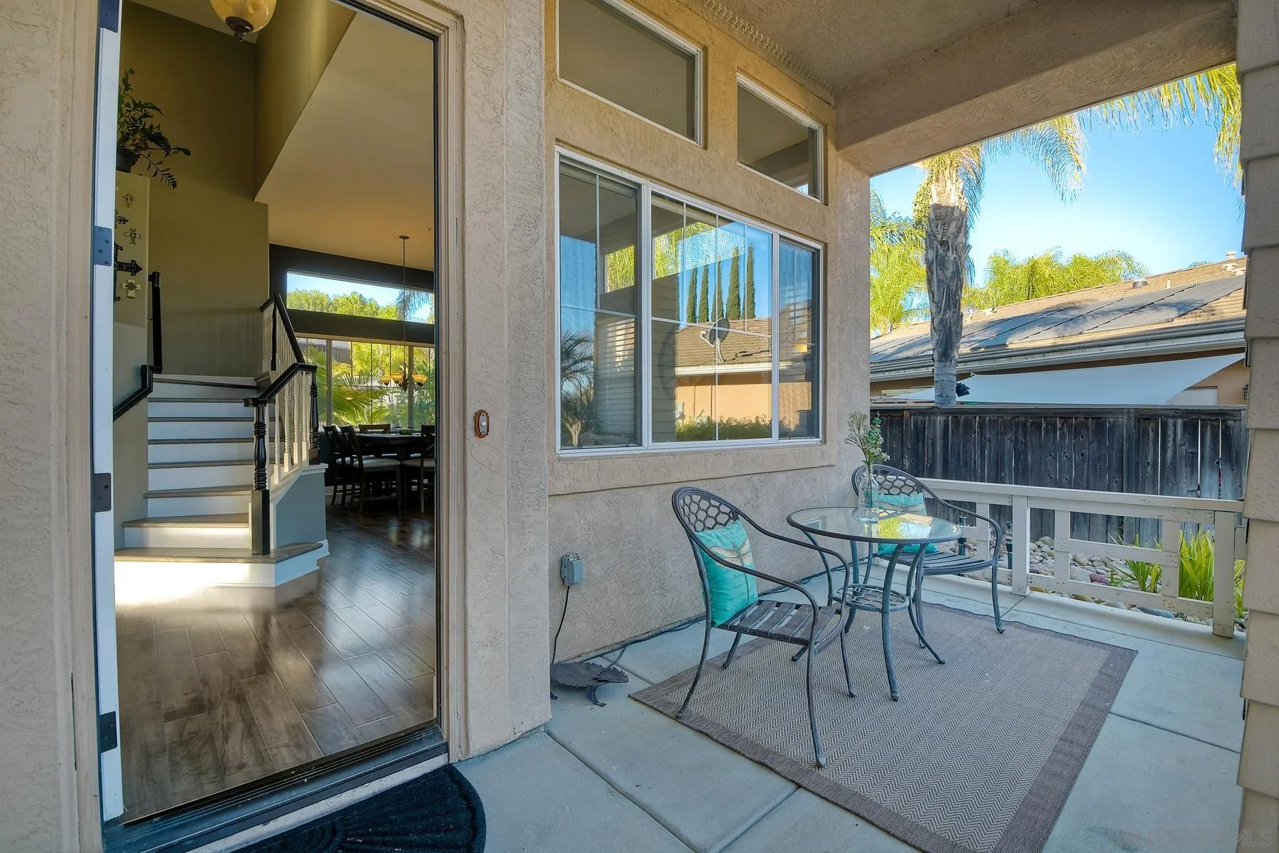 10340 Hitching Post Way Santee, CA 92071 - Photo 6 of 50 a balcony with table and chairs