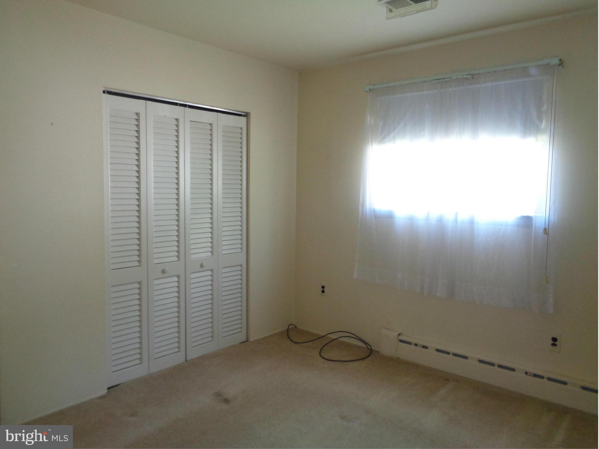 806 Back River Neck Road Baltimore, MD 21221 - Photo 14 of 28 an empty room with a door