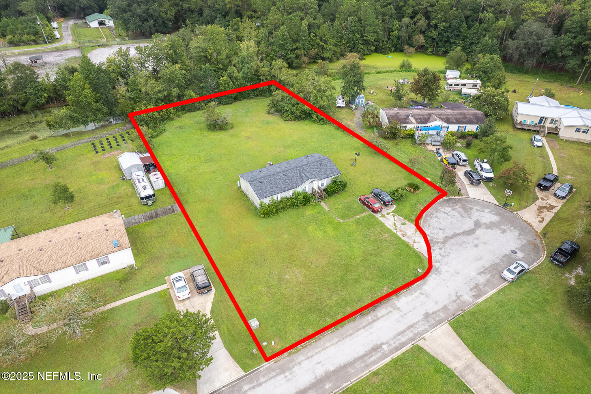 10259 Rabbit Ridge Road Jacksonville, FL 32219 - Photo 6 of 16 an aerial view of a pool