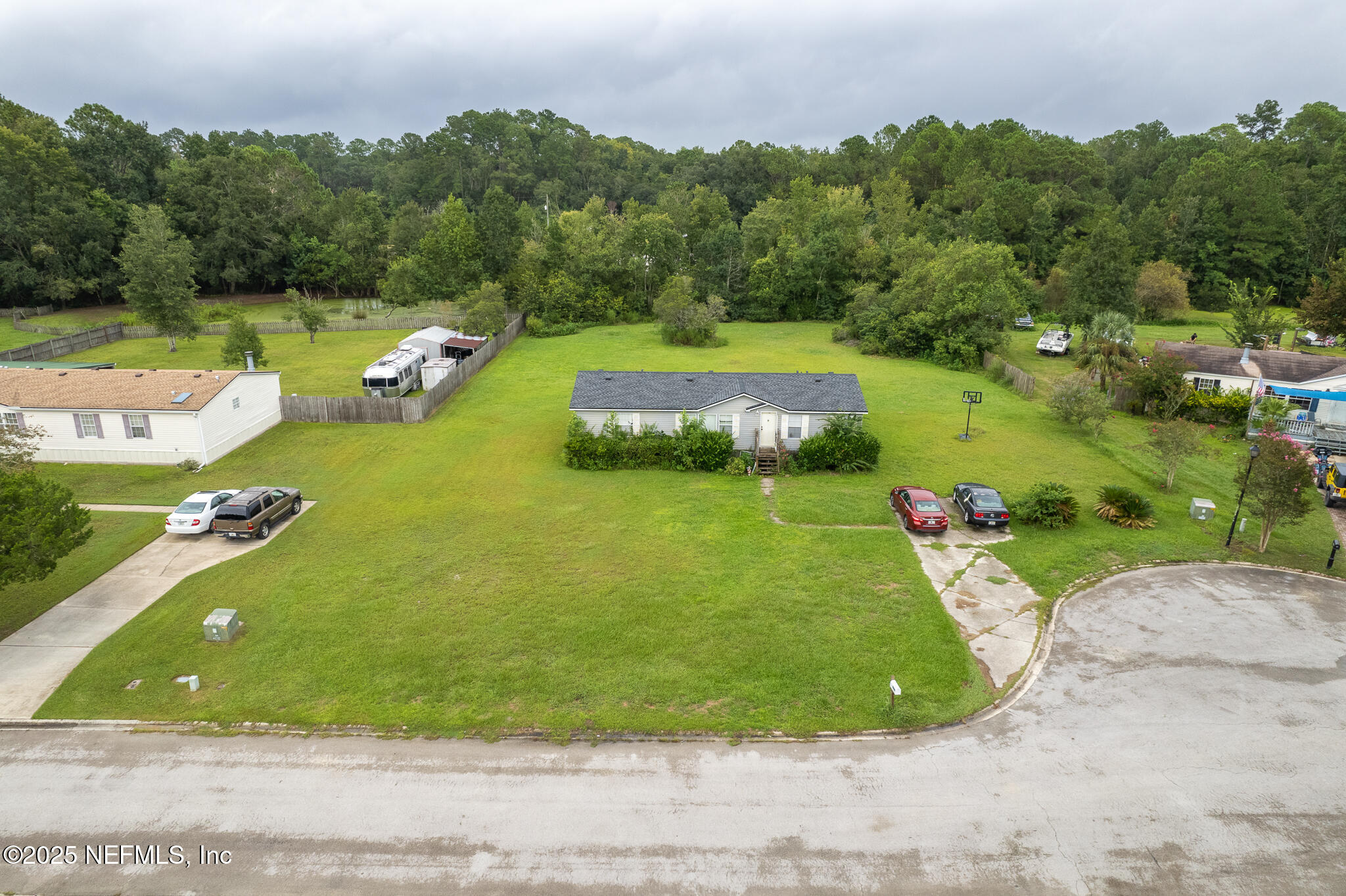 10259 Rabbit Ridge Road Jacksonville, FL 32219 - Photo 8 of 16 a view of a golf course with chairs