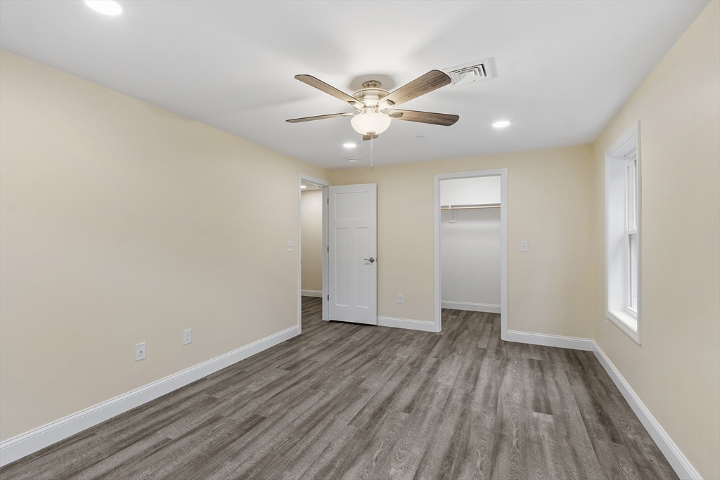 20 Townsend Street, Unit 2 Pepperell, MA 01463 - Photo 18 of 23 wooden floor in an empty room with a window
