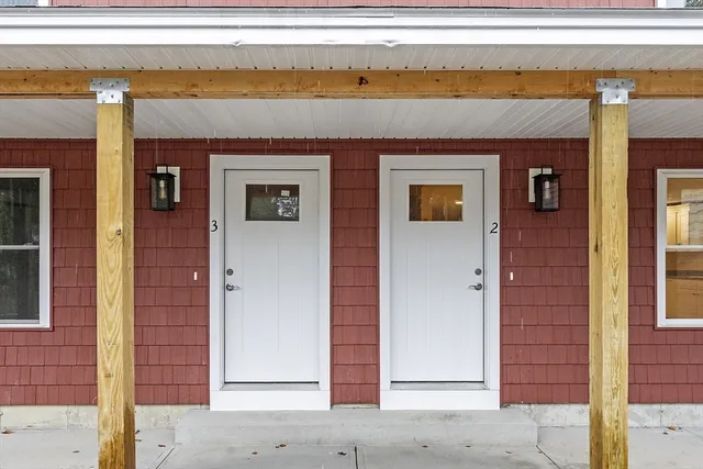 a front view of a building with a outdoor space