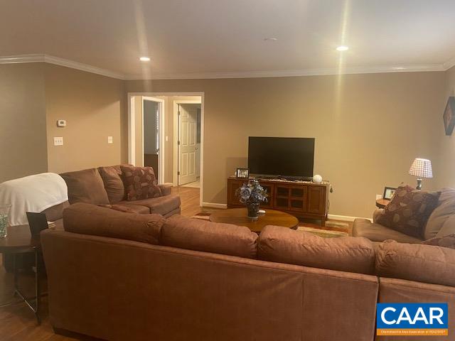 32 Buttercup Road Ruckersville, VA 22968 - Photo 10 of 14 a living room with furniture and a flat screen tv