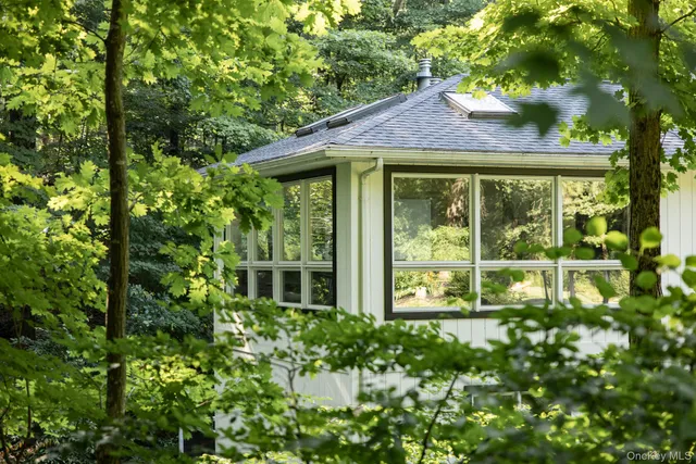 a view of a house with a small garden