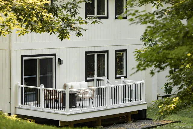 a view of a house with a window and deck