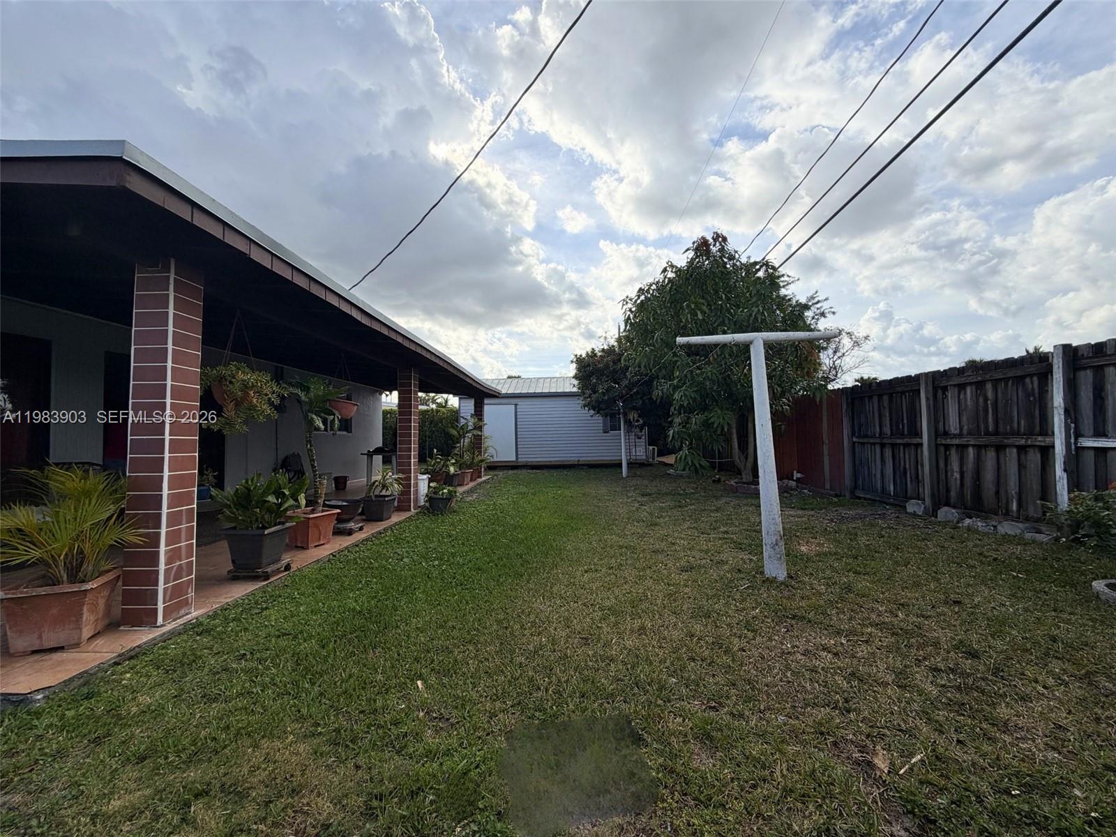 9255 Southwest 43rd Terrace Miami, FL 33165 - Photo 20 of 21 a view of a backyard