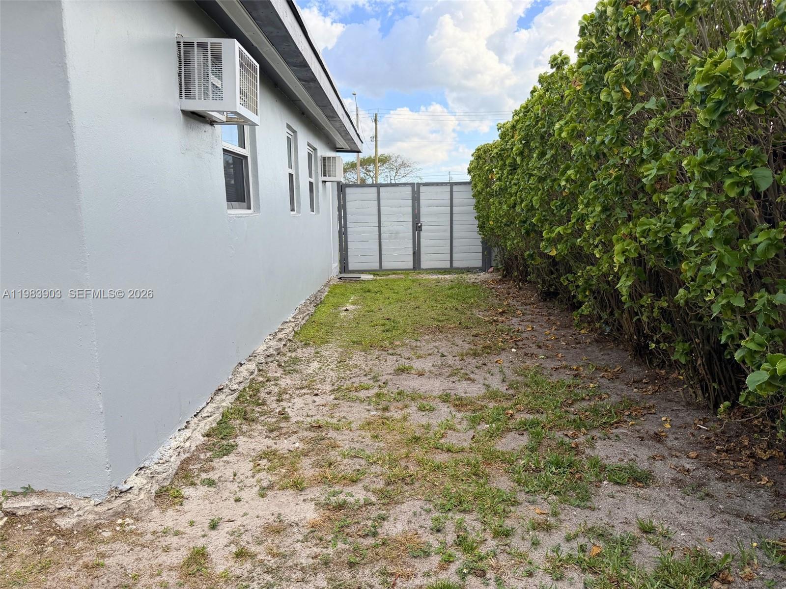 9255 Southwest 43rd Terrace Miami, FL 33165 - Photo 21 of 21 a view of a backyard of the house