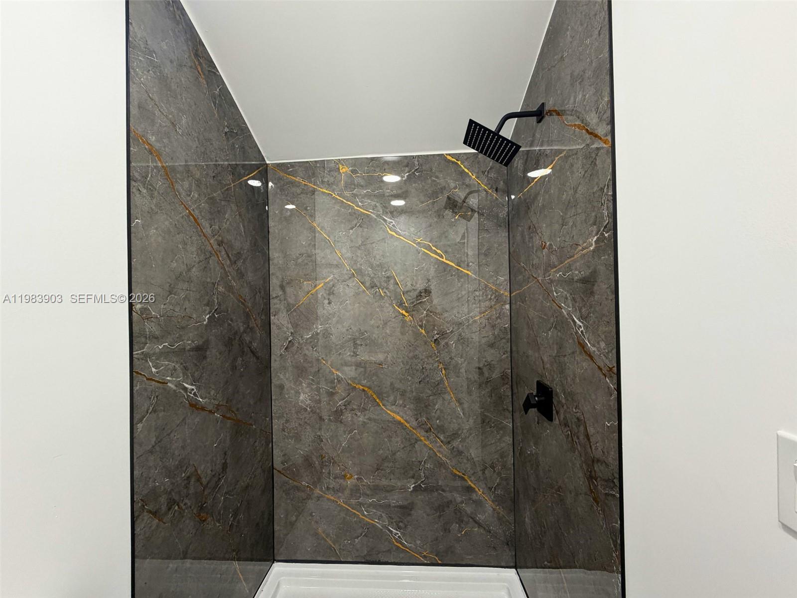 9255 Southwest 43rd Terrace Miami, FL 33165 - Photo 7 of 21 a bathroom with a shower