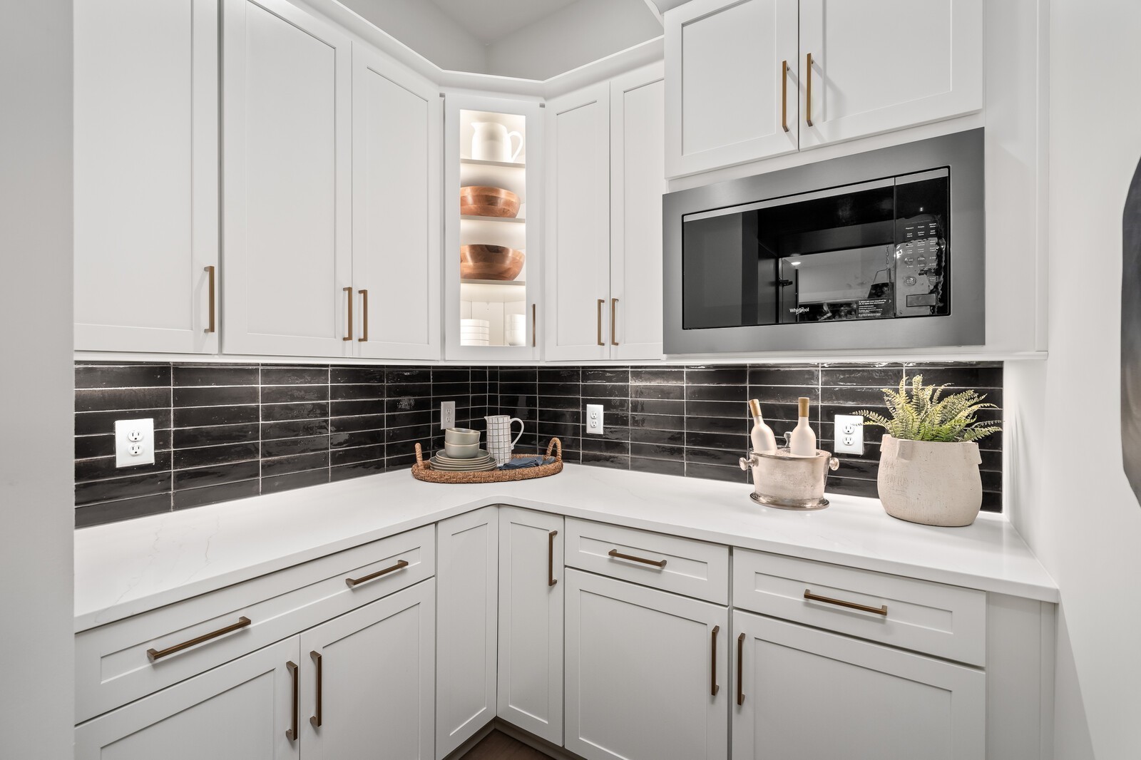 7221 Severide Street Fairview, TN 37062 - Photo 36 of 96 a kitchen with white cabinets and white appliances