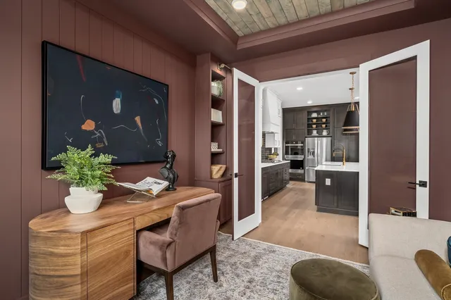 a kitchen with a stove and cabinets