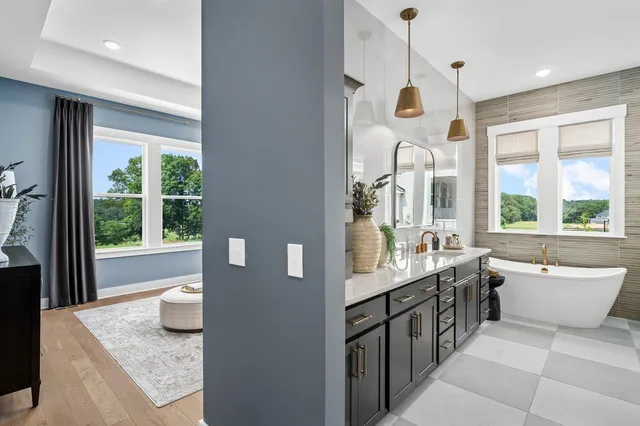a view of living room with furniture and a fireplace