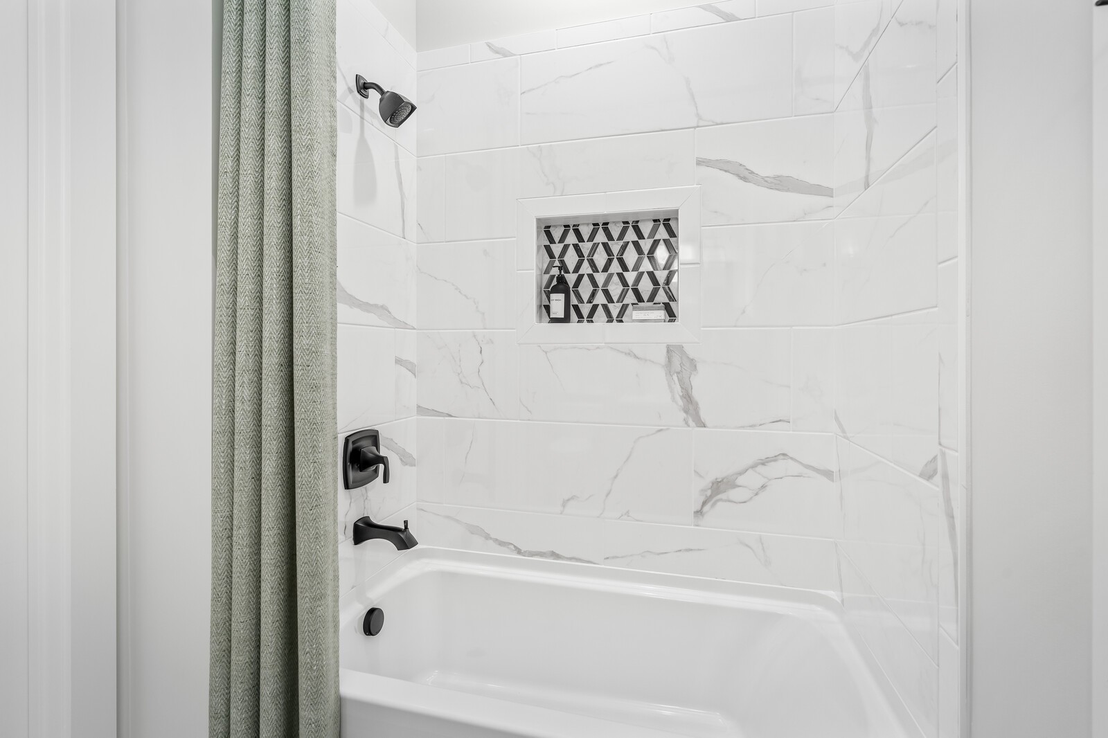 7221 Severide Street Fairview, TN 37062 - Photo 58 of 96 a bathroom with a bathtub and shower