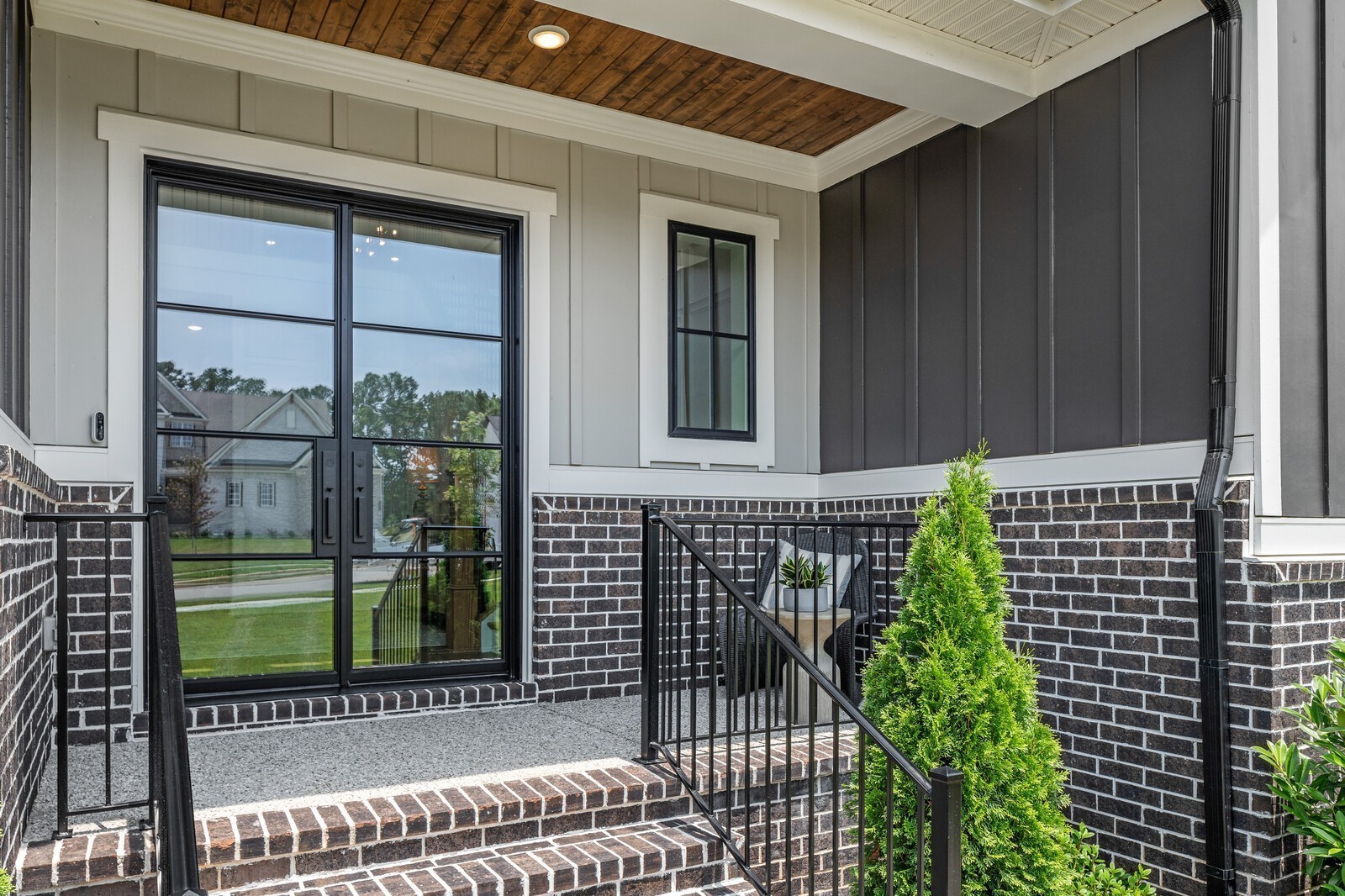 7221 Severide Street Fairview, TN 37062 - Photo 8 of 96 a front view of a house with a garden