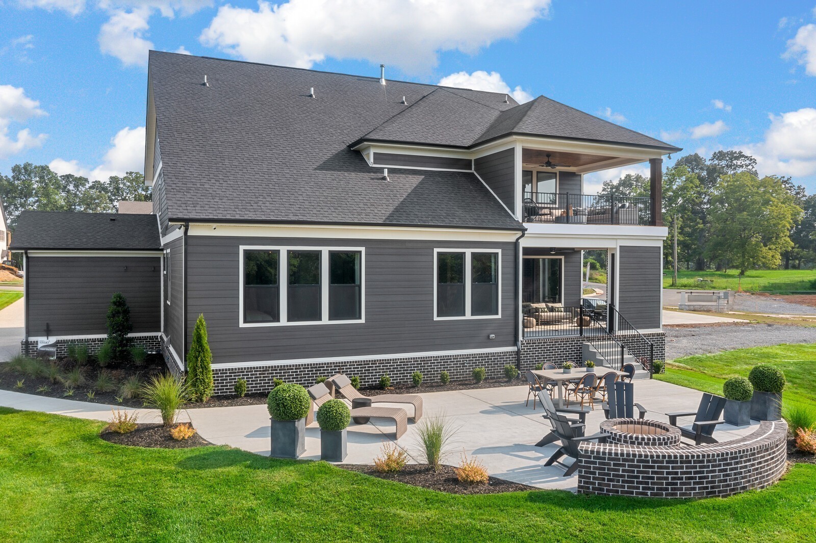 7221 Severide Street Fairview, TN 37062 - Photo 95 of 96 a front view of a house with garden and patio
