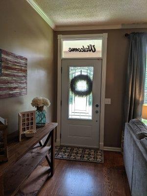 90 Faith-Rae Boulevard Morrison, TN 37357 - Photo 3 of 22 a view of an empty room with wooden floor and a window