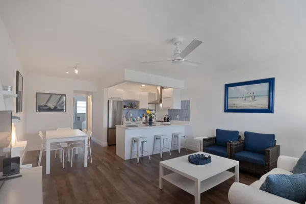 a living room with furniture and a table