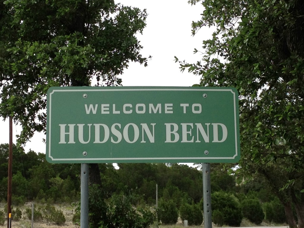 5505 Hiline Road Austin, TX 78734 - Photo 1 of 1 a sign broad in front of the red tree