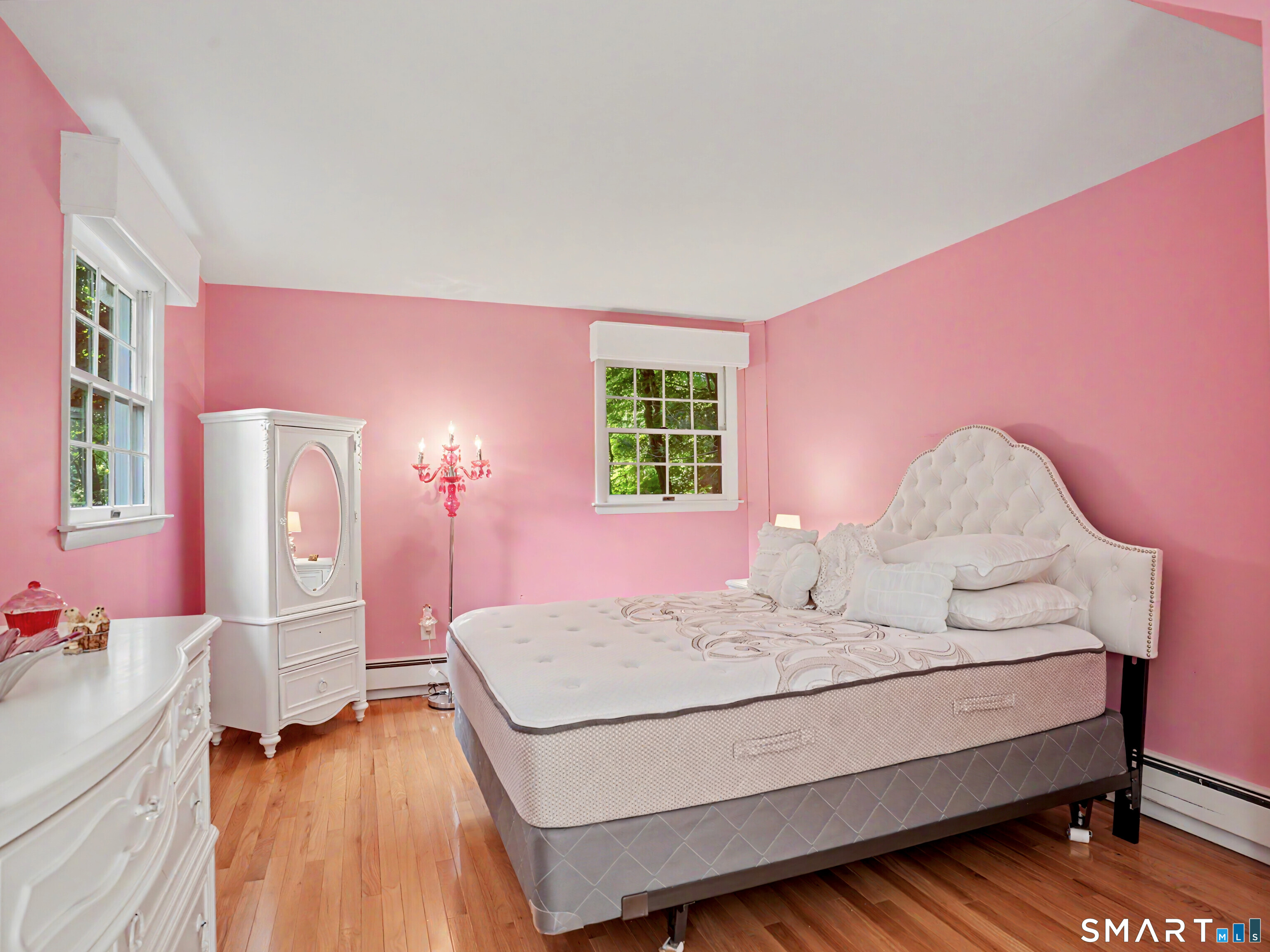 15 Flat Rock Drive Ridgefield, CT 06877 - Photo 32 of 39 a bedroom with a bed and a dresser