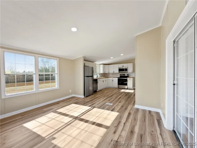 a view of a house with wooden floor