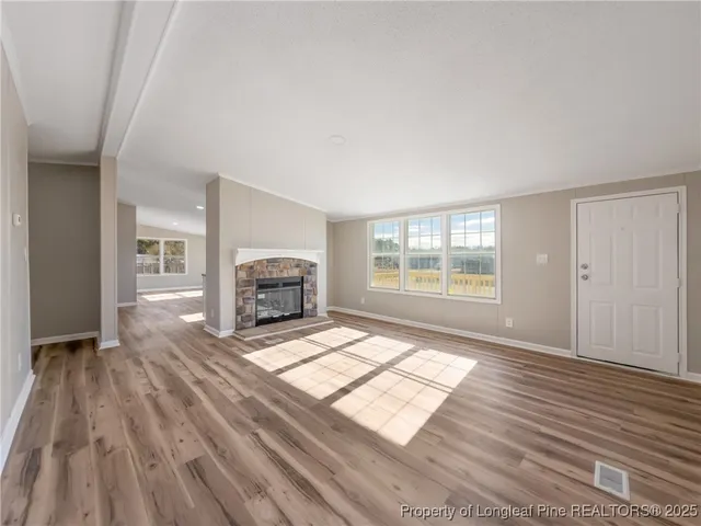 a view of livingroom with furniture and fireplace