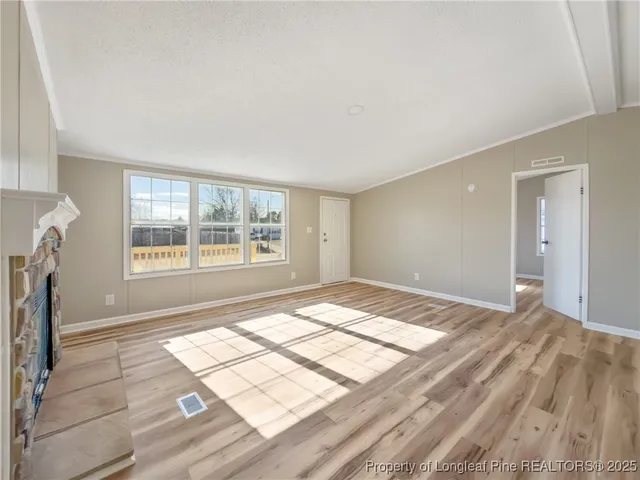 a view of a livingroom with a fireplace