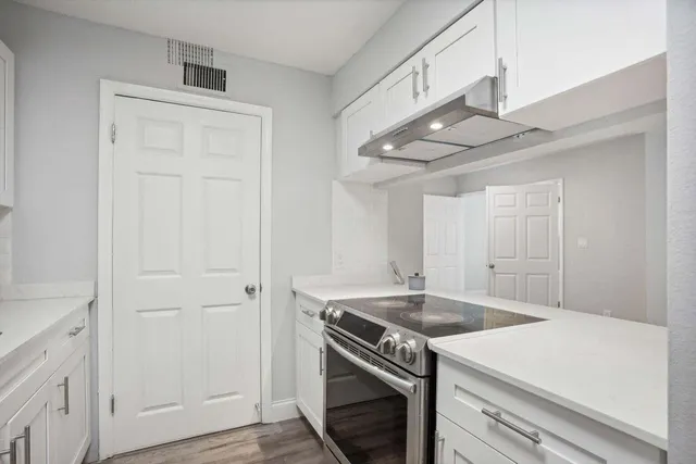 a kitchen with a stove