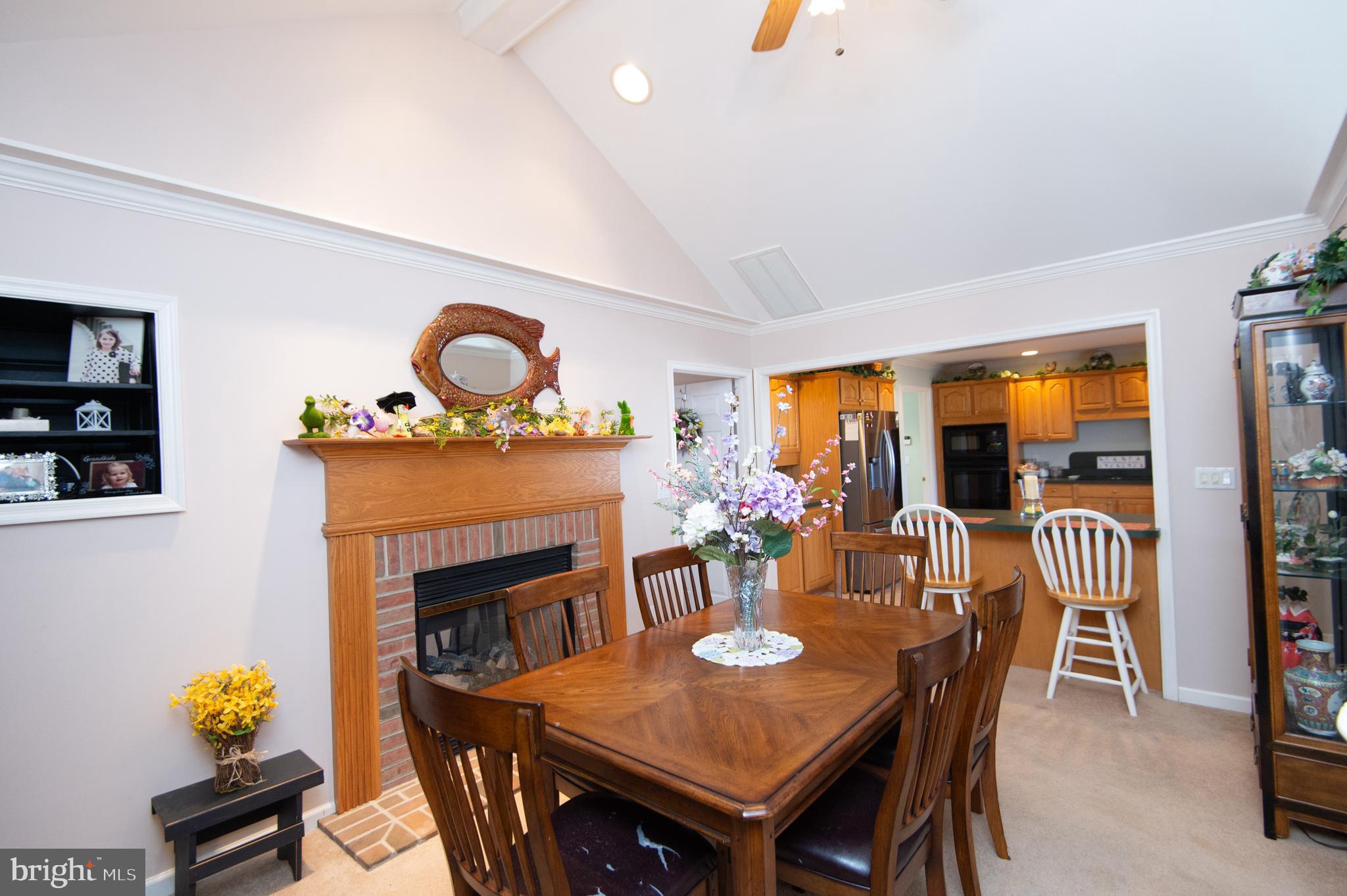 9 Holly Terrace Cambridge, MD 21613 - Photo 11 of 49 a view of a dining room with furniture window and outside view