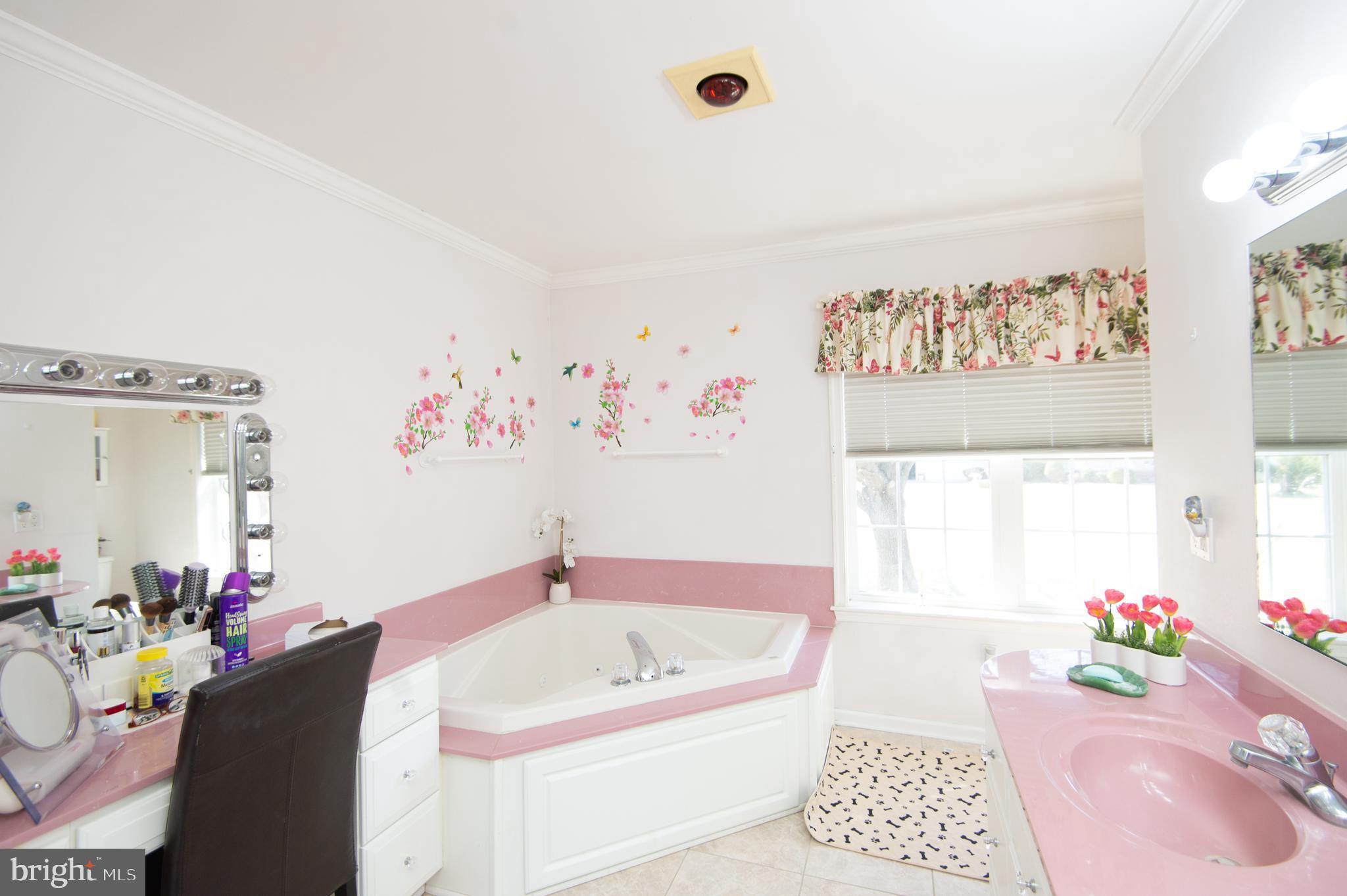 9 Holly Terrace Cambridge, MD 21613 - Photo 33 of 49 a white bath tub sitting next to a white sink