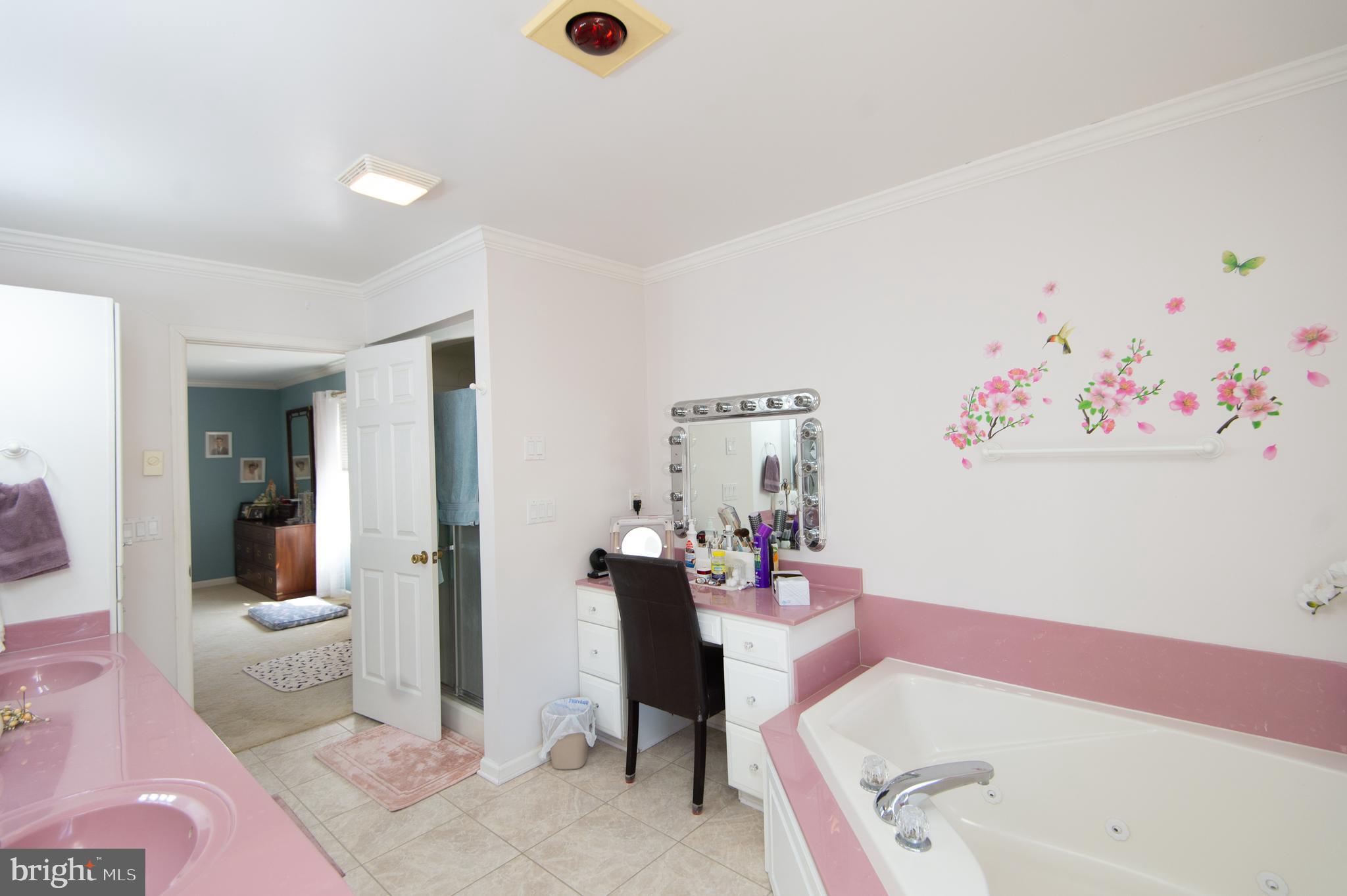 9 Holly Terrace Cambridge, MD 21613 - Photo 35 of 49 a living room with furniture and a gate