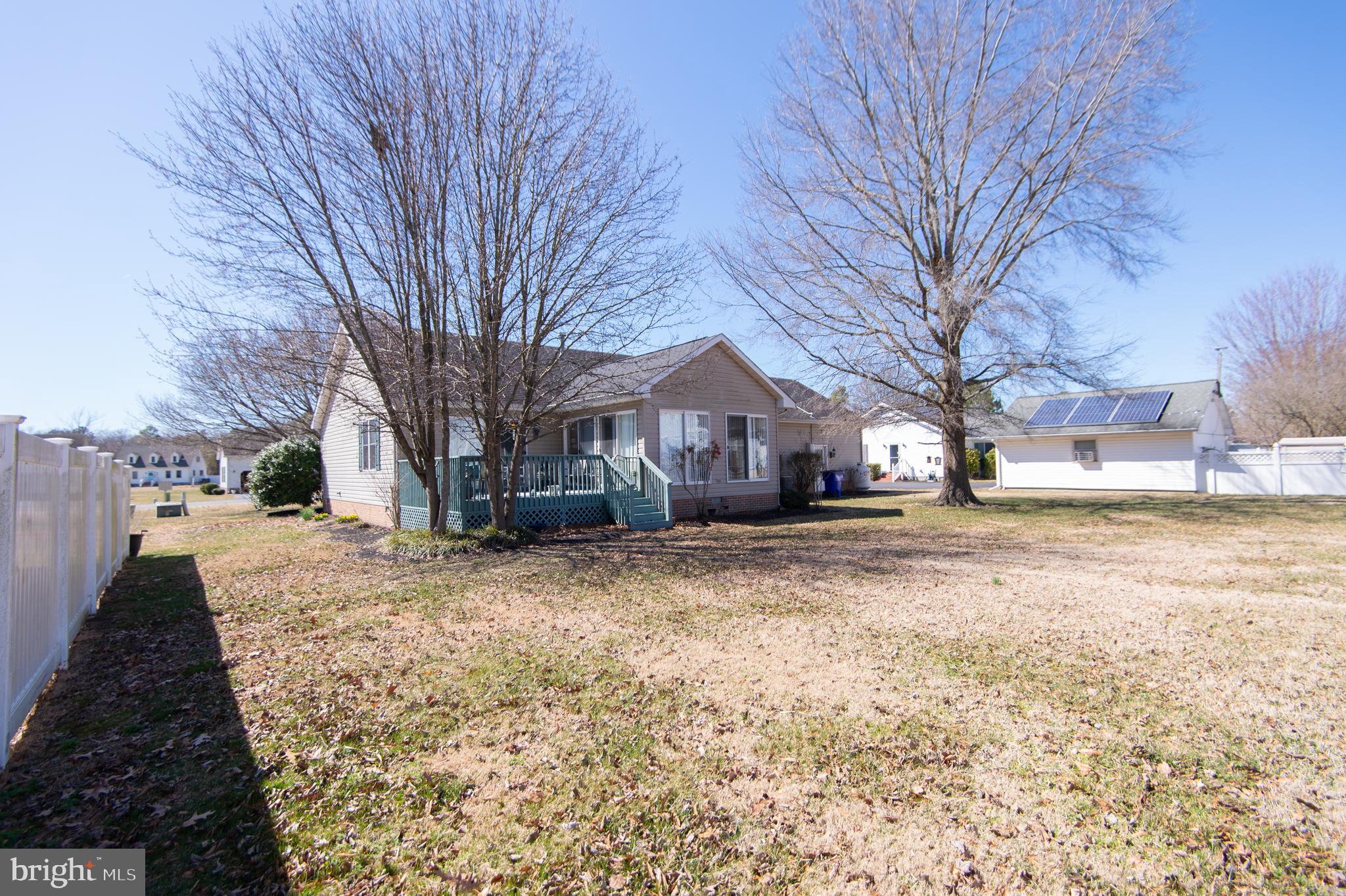 9 Holly Terrace Cambridge, MD 21613 - Photo 44 of 49 a view of a house with a yard covered in snow