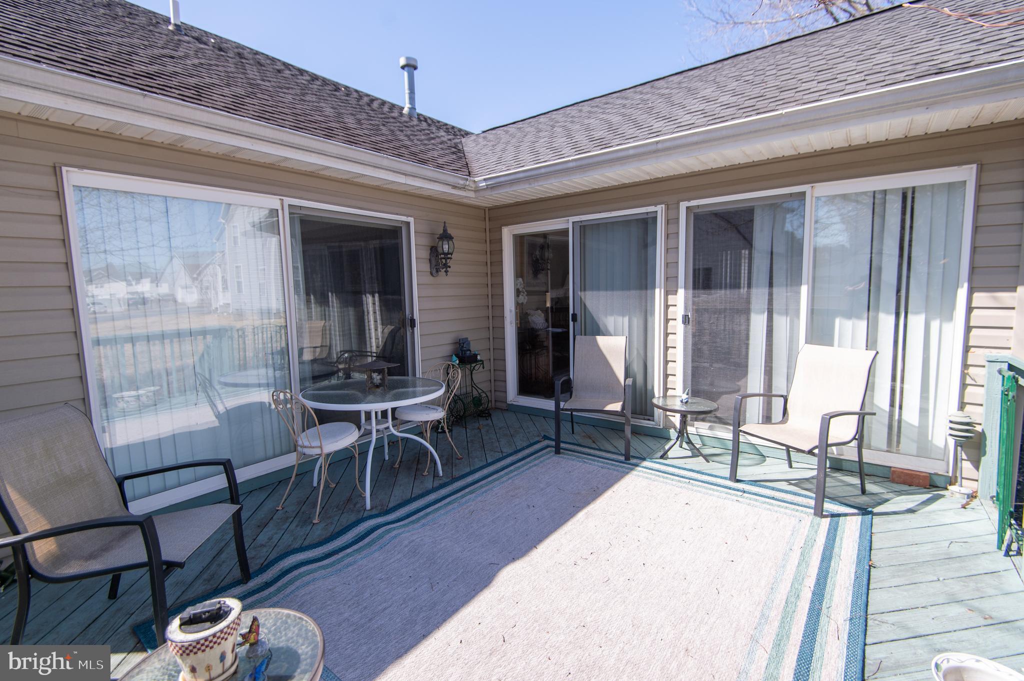 9 Holly Terrace Cambridge, MD 21613 - Photo 46 of 49 a living room with furniture and a window