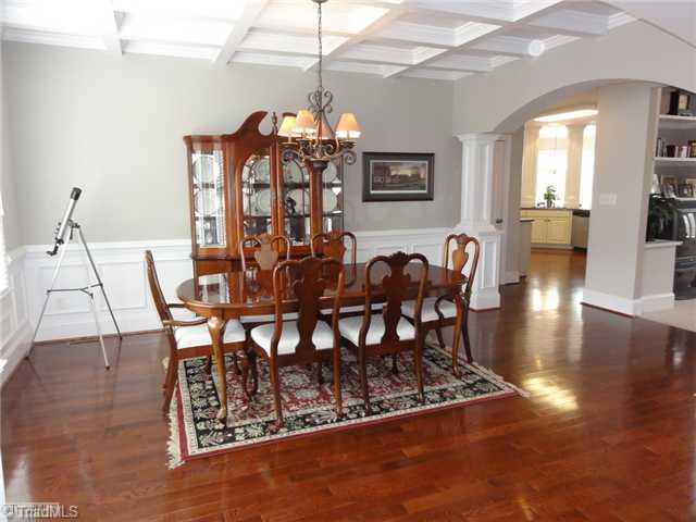 4137 Gumtree Road Winston-Salem, NC 27107 - Photo 3 of 16 Dining Room. The elegant dining room makes formal entertaining easy! Notice the coffered ceiling and gorgeous hardwood floors!