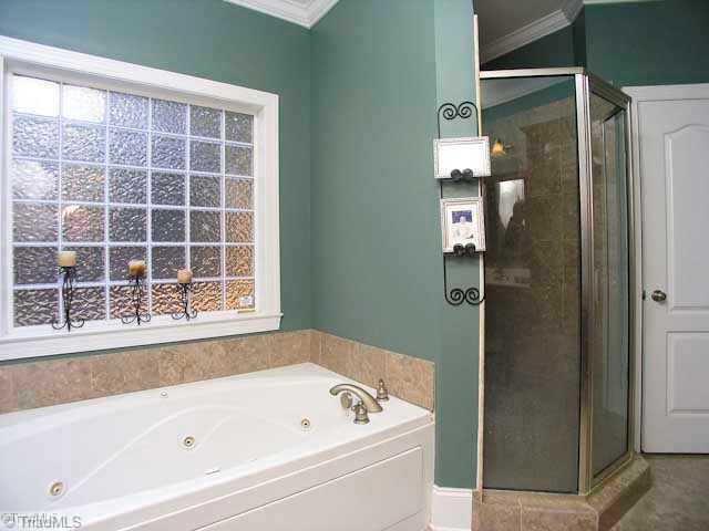 4137 Gumtree Road Winston-Salem, NC 27107 - Photo 9 of 16 Master Bath/Spa. A jetted tub and separate shower (and another walk in closet!) make this the perfect master bath!