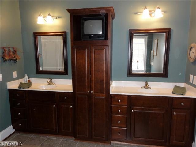 4137 Gumtree Road Winston-Salem, NC 27107 - Photo 10 of 16 Master Bath/Spa. Double vanities = no more juggling in the morning! Notice the built in storage!