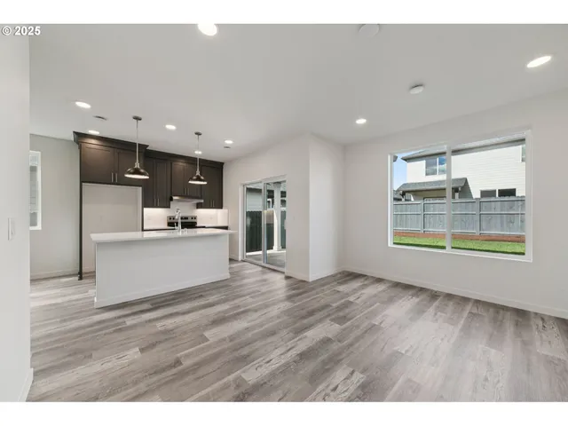 a view of kitchen with wooden floor