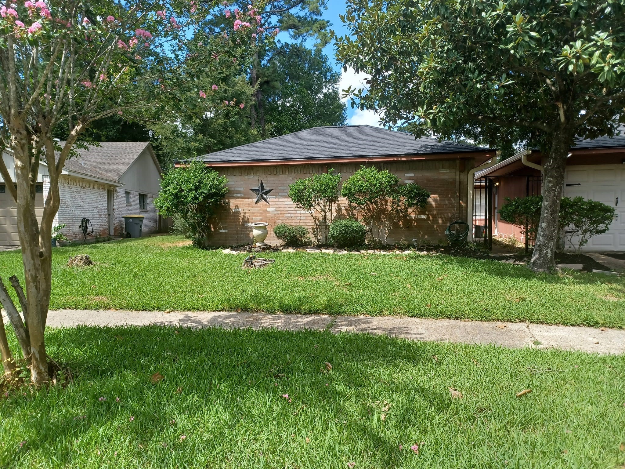 23407 Little Wind Lane Spring, TX 77373 - Photo 5 of 7 a view of a house with a yard
