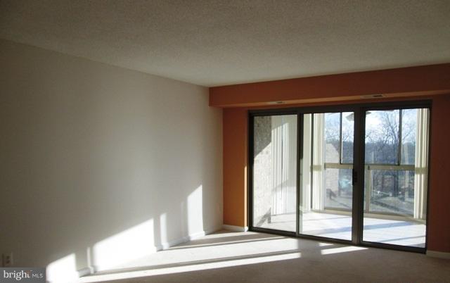19385 Cypress Ridge Terrace, Unit 704 Leesburg, VA 20176 - Photo 5 of 13 Living Room